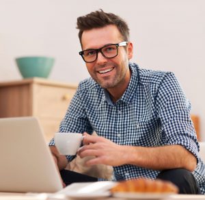 smiling-man-working-at-home